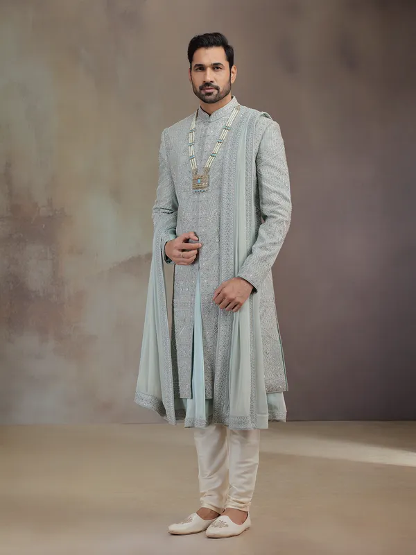 Sea green silk groom sherwani with dupatta