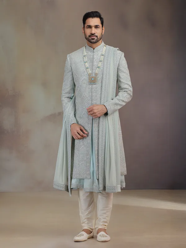 Sea green silk groom sherwani with dupatta