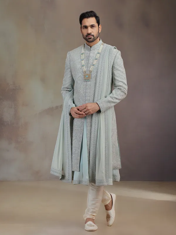 Sea green silk groom sherwani with dupatta