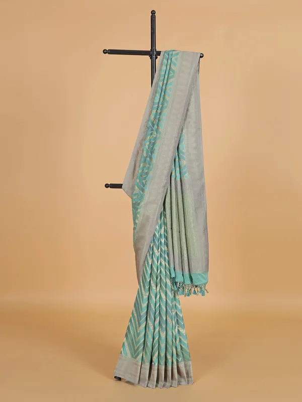 Sea green wedding wear georgette saree with zari weaving
