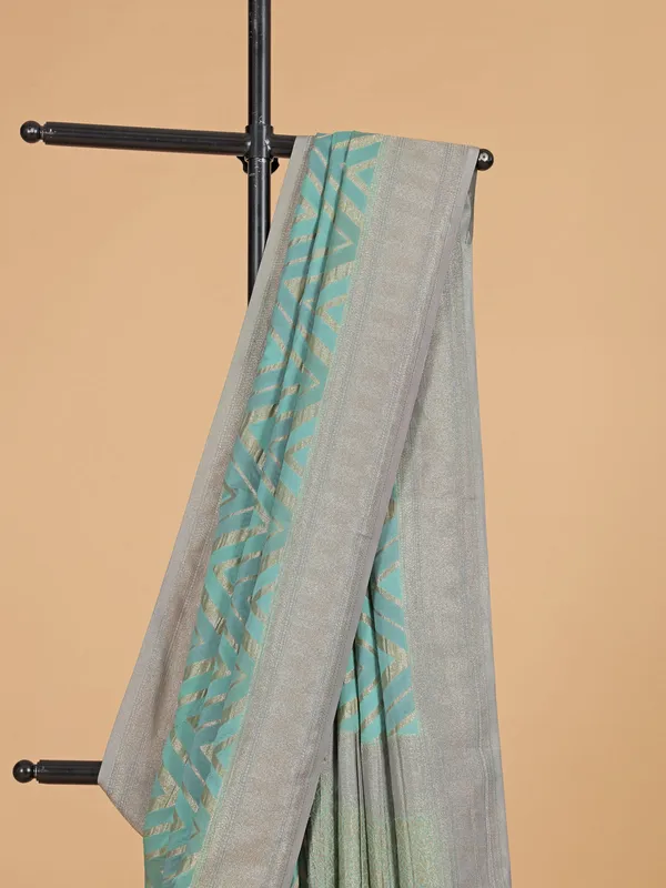 Sea green wedding wear georgette saree with zari weaving