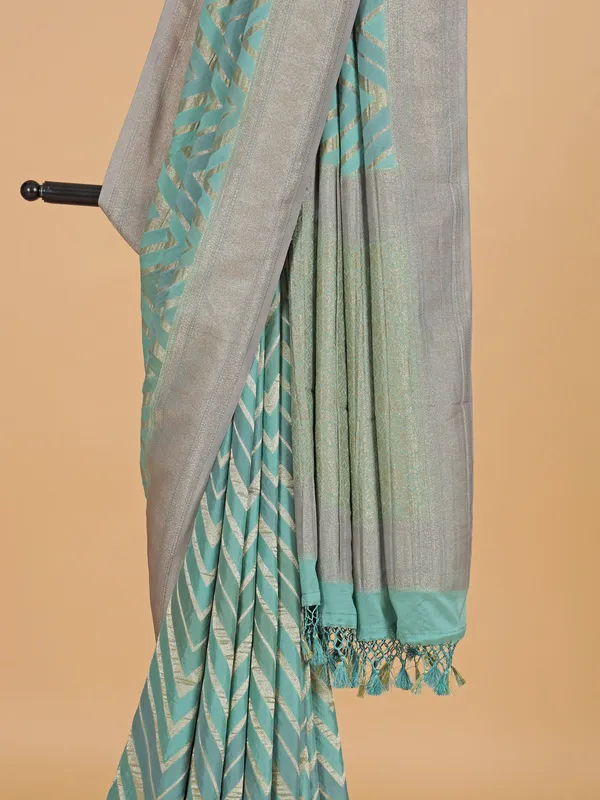 Sea green wedding wear georgette saree with zari weaving