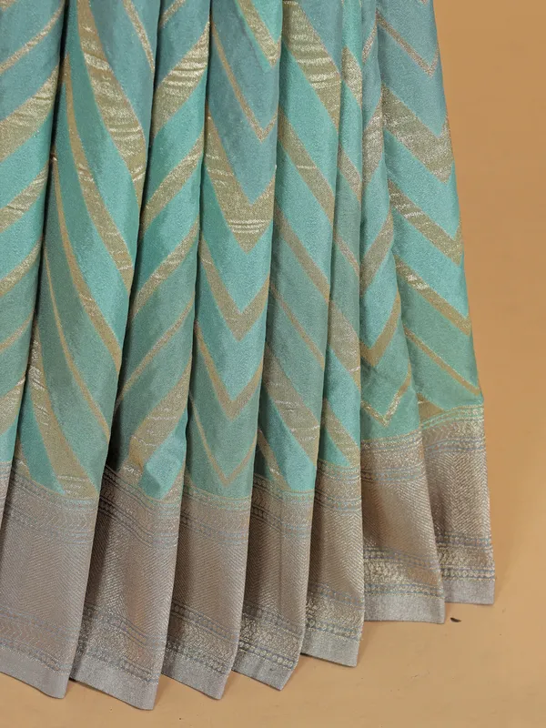 Sea green wedding wear georgette saree with zari weaving