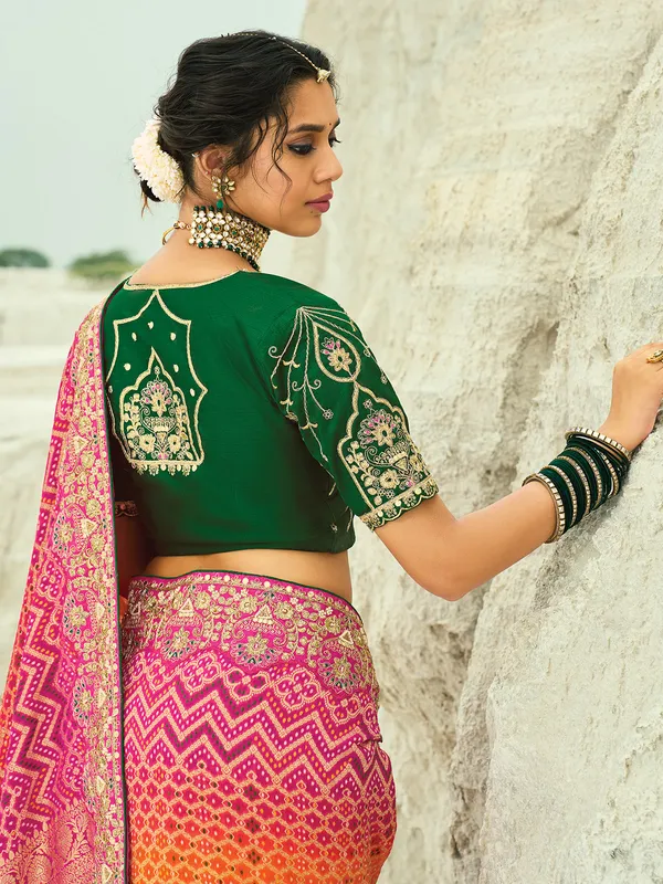 Shaded orange and rani color bandhej georgette saree