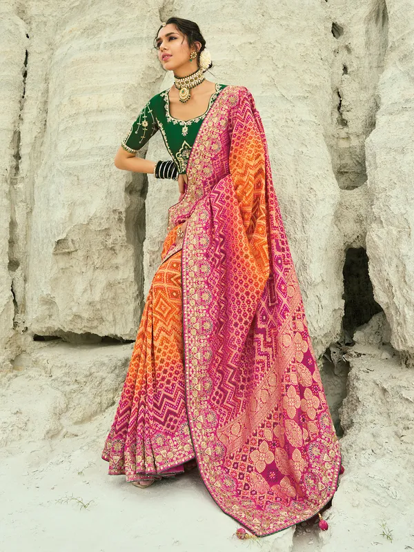 Shaded orange and rani color bandhej georgette saree