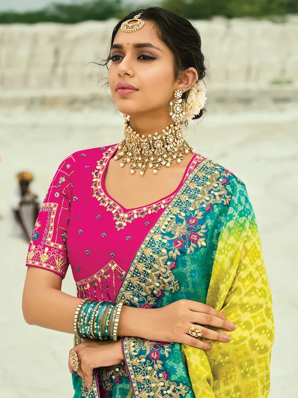 Shaded yellow and rama green bandhej georgette saree