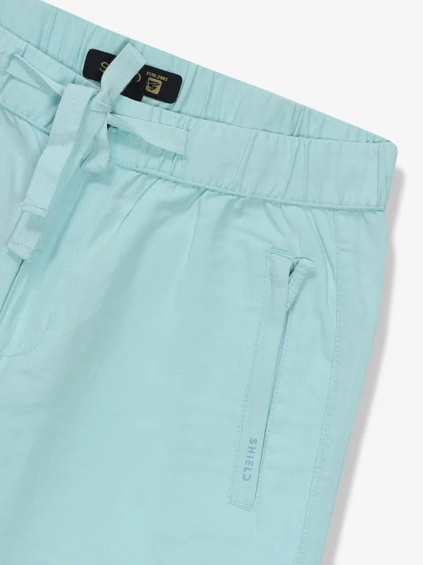SHIELD mint blue solid shorts