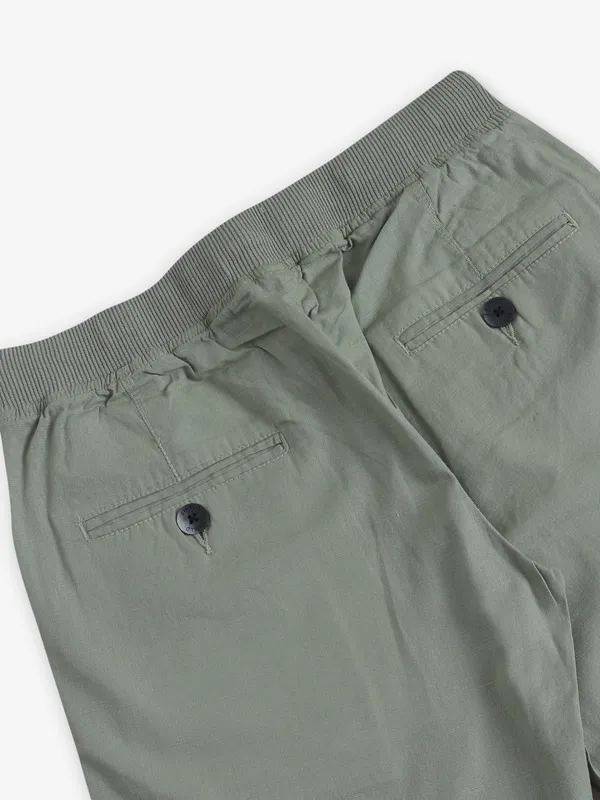 SHIELD pista green cotton shorts