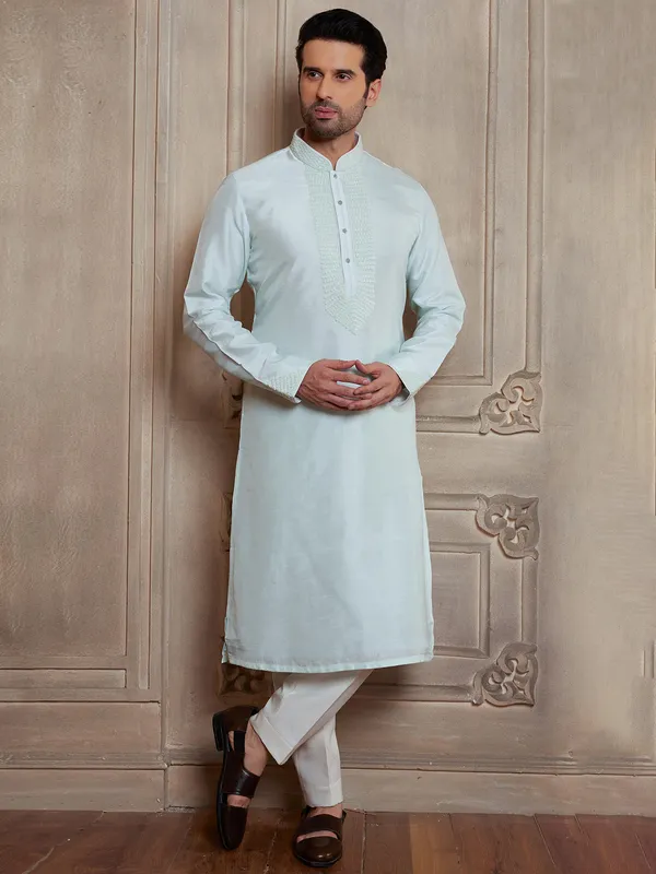 Shiny light green raw silk kurta suit