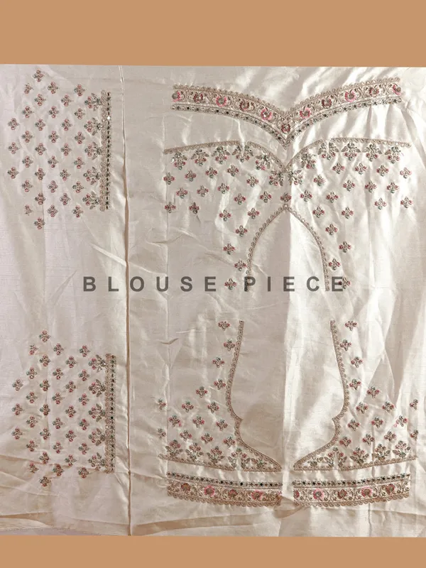 Silk based wedding style cream lehenga choli