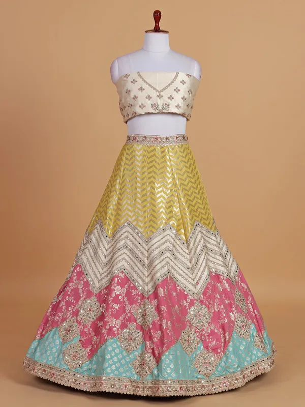 Silk based wedding style cream lehenga choli