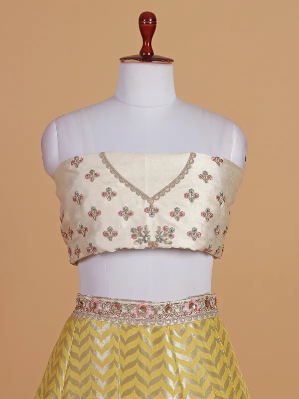 Silk based wedding style cream lehenga choli