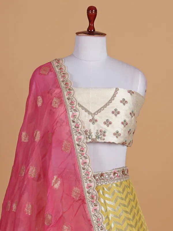 Silk based wedding style cream lehenga choli