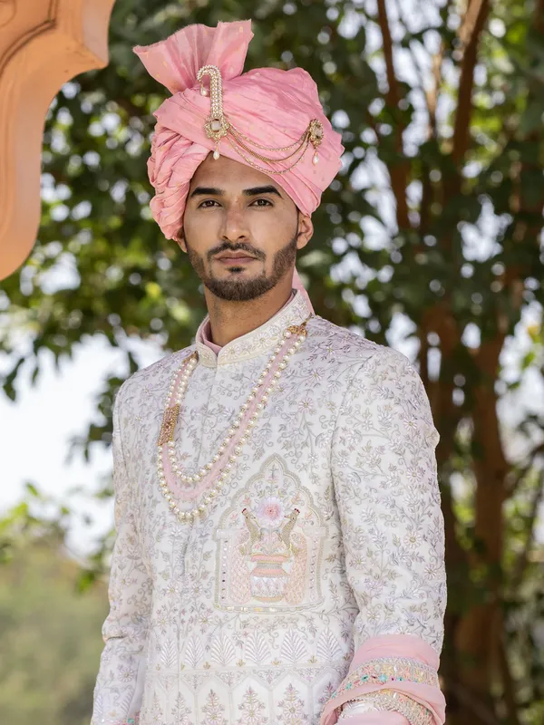Silk cream and pink sherwani for groom