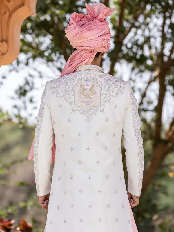 Silk cream and pink sherwani for groom