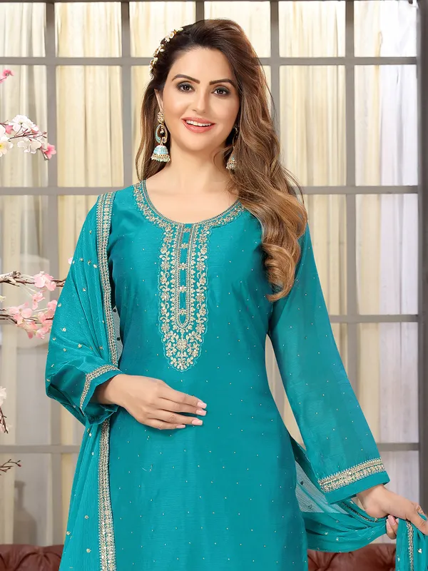 Silk festive salwar suit in teal blue