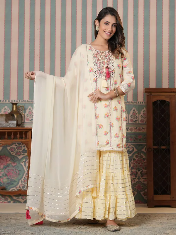 Silk printed light yellow sharara suit