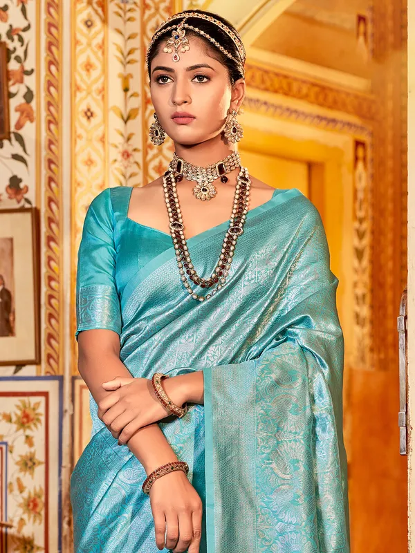 Silk sea green shaded zari weaving saree