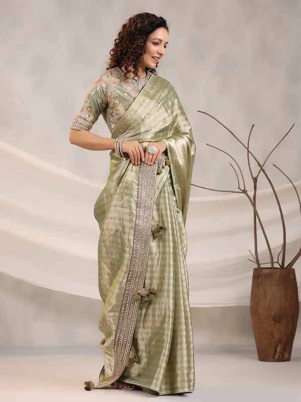 Silk stripe pista green saree