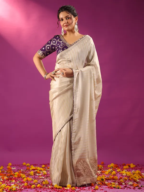 Silver silk festive ready saree with purple blouse