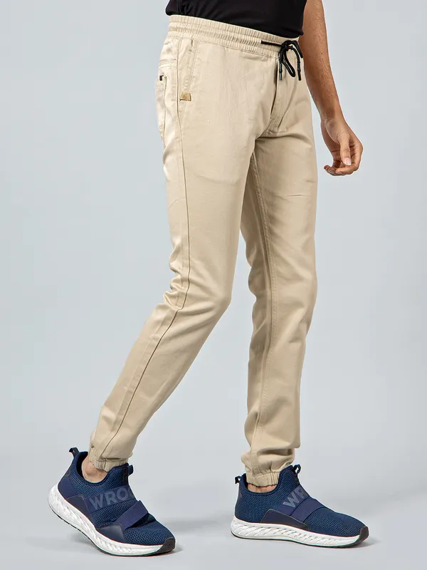 Sixth Element presents beige hue track pant