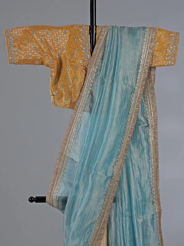 Sky blue and beige organza saree with zari work
