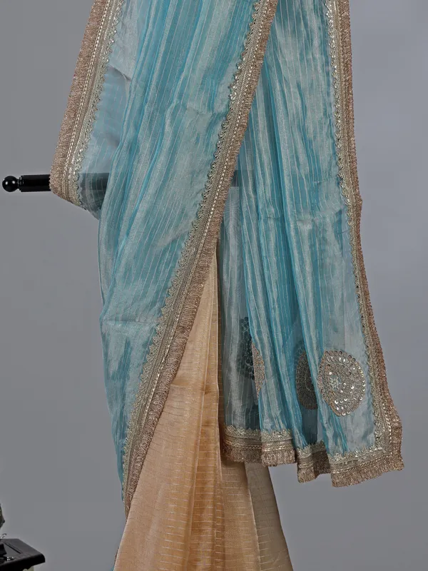 Sky blue and beige organza saree with zari work