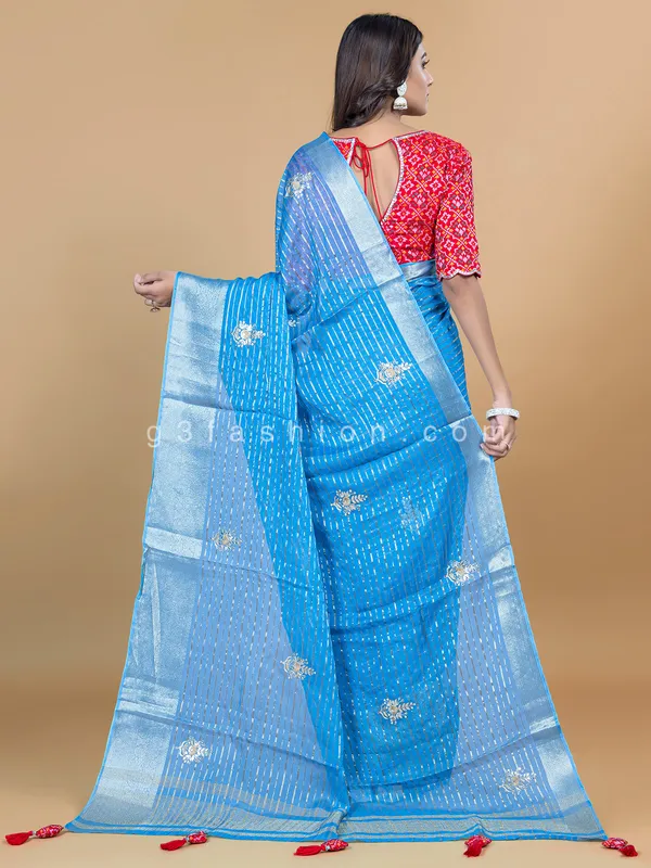 Aqua organza saree for festive wear
