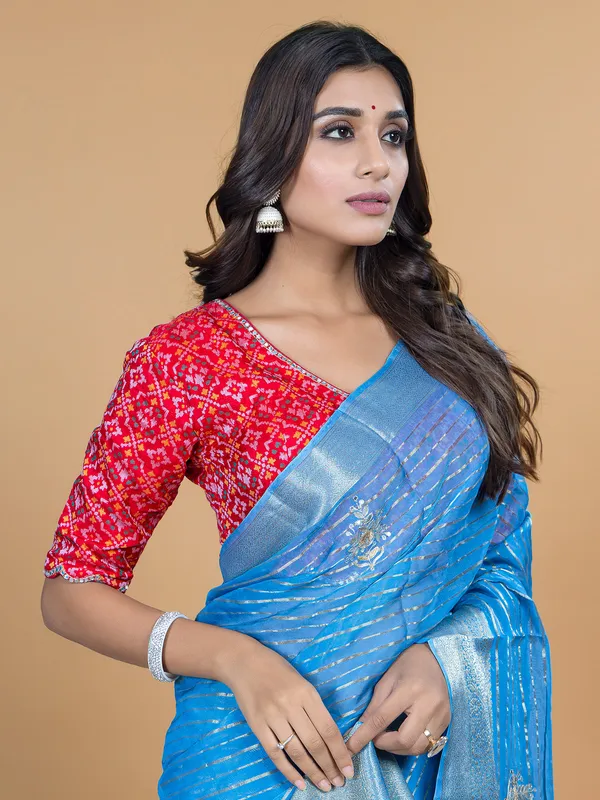 Aqua organza saree for festive wear