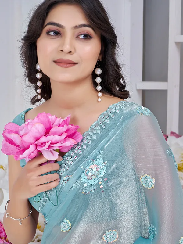 Sky blue organza saree with delicate hand embroidery