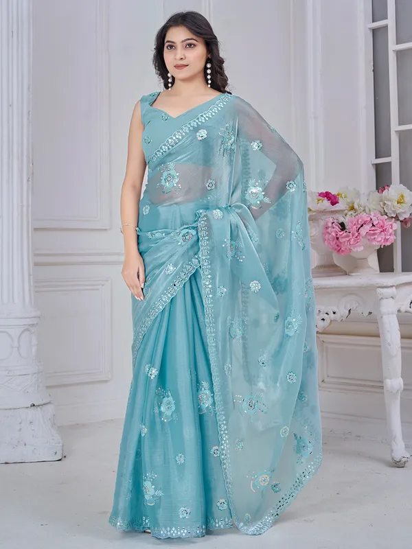 Sky blue organza saree with delicate hand embroidery