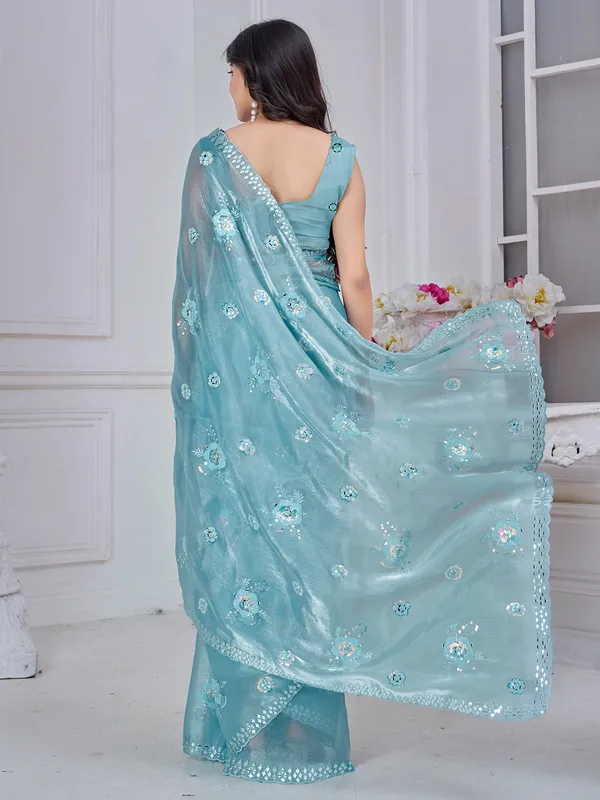 Sky blue organza saree with delicate hand embroidery