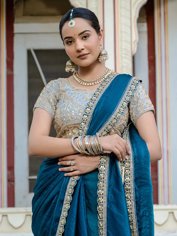 Sky blue satin silk saree with festive charm