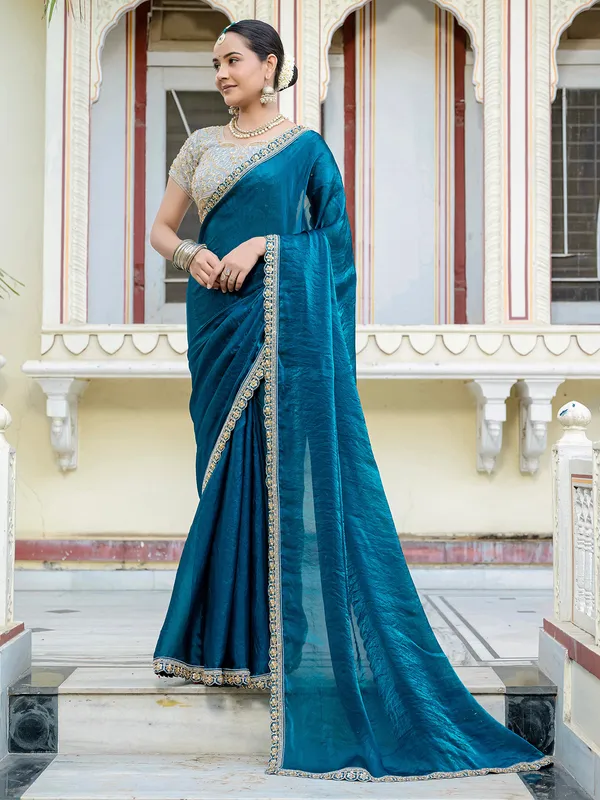 Sky blue satin silk saree with festive charm
