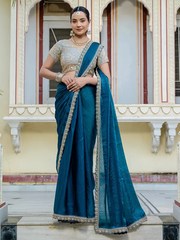 Sky blue satin silk saree with festive charm