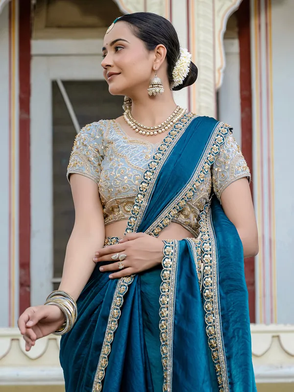 Sky blue satin silk saree with festive charm