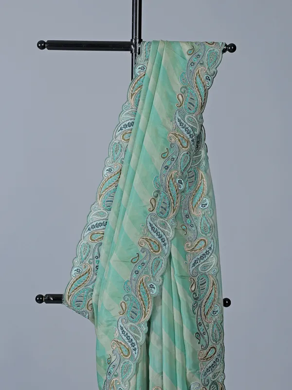 Sky blue silk printed embroidered saree unstitched