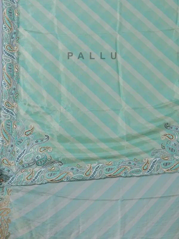 Sky blue silk printed embroidered saree unstitched