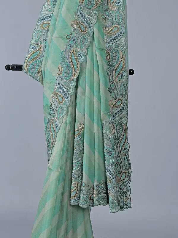 Sky blue silk printed embroidered saree unstitched