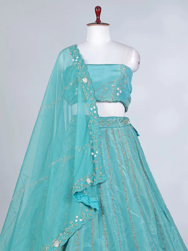 Sky blue tissue silk pearl and cutdana lehenga choli