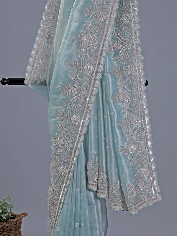 Sky blue tissue silk saree with rich cutdana embellishment