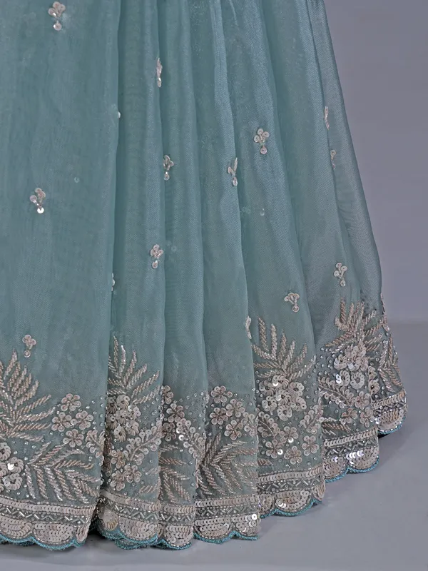 Sky blue tissue silk saree with rich cutdana embellishment