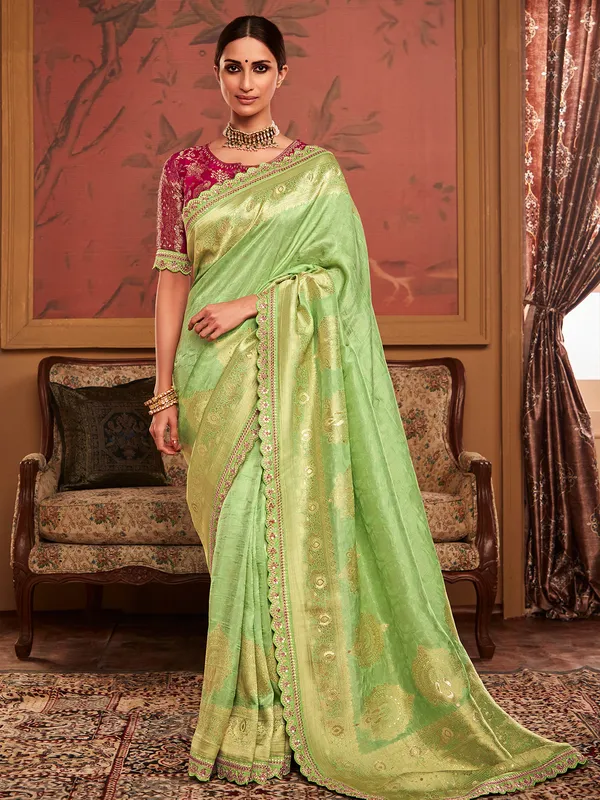 Soft dola silk pista green saree