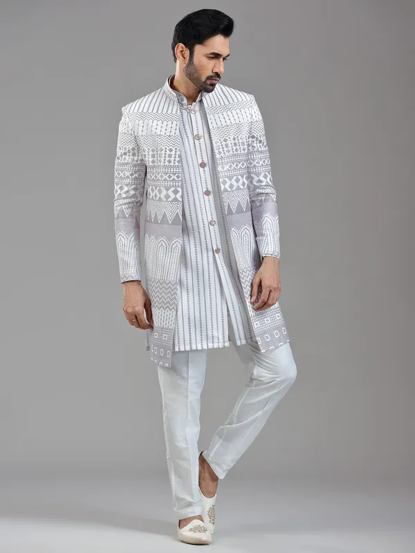 Sophisticated white silk jacket style indowestern with resham