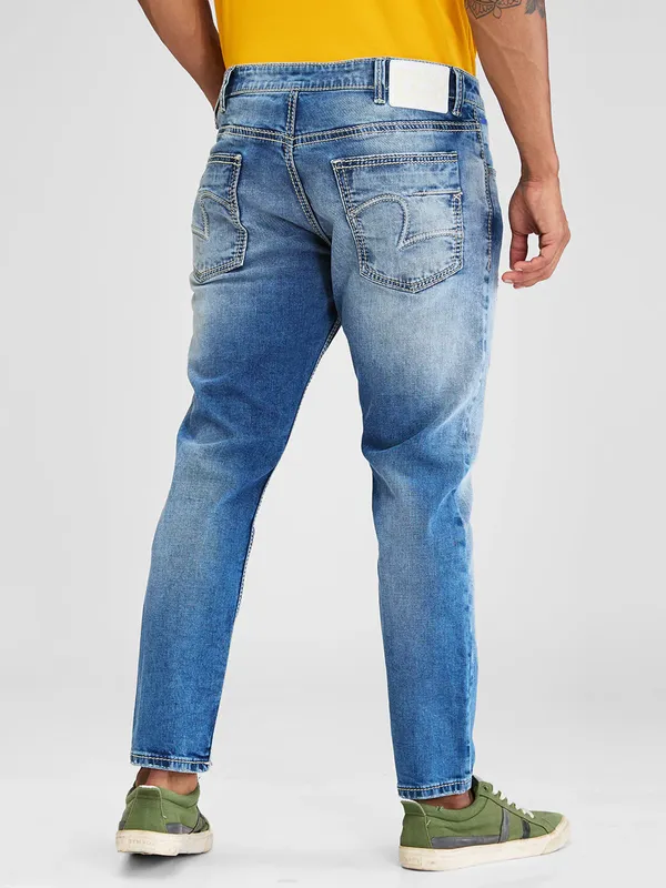 SPYKAR blue washed and ripped ankle legnth fit denim jeans