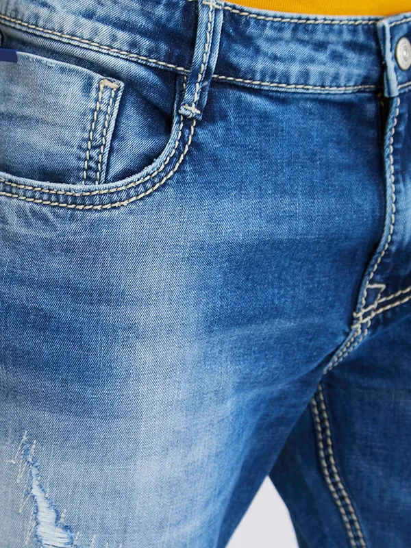 SPYKAR blue washed and ripped ankle legnth fit denim jeans
