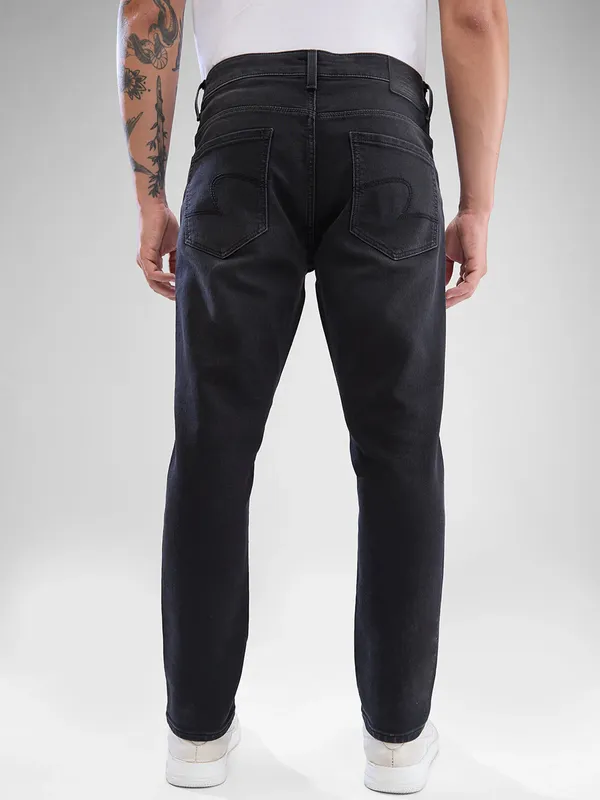 SPYKAR solid black denim jeans for men