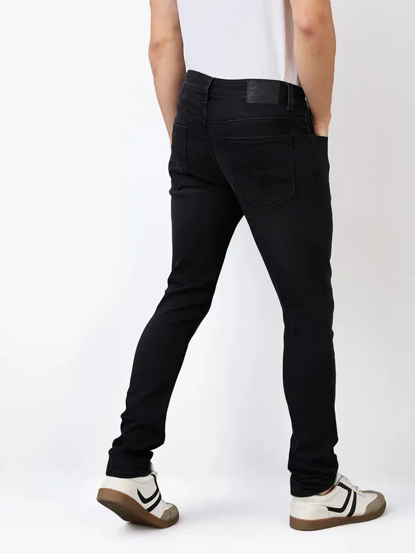 SPYKAR solid black skinny fit denim jeans for men