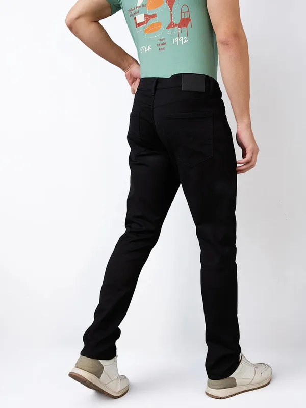 SPYKAR solid black skinny fit jeans for men