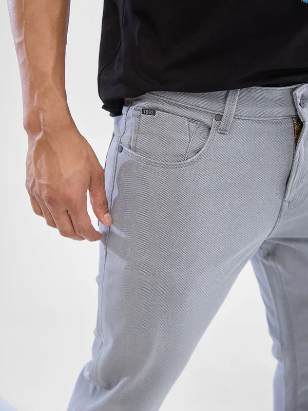 SPYKAR solid grey slim fit jeans